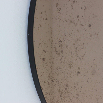 Antiqued Bronze Tinted Orbis Round Mirror - Black Frame