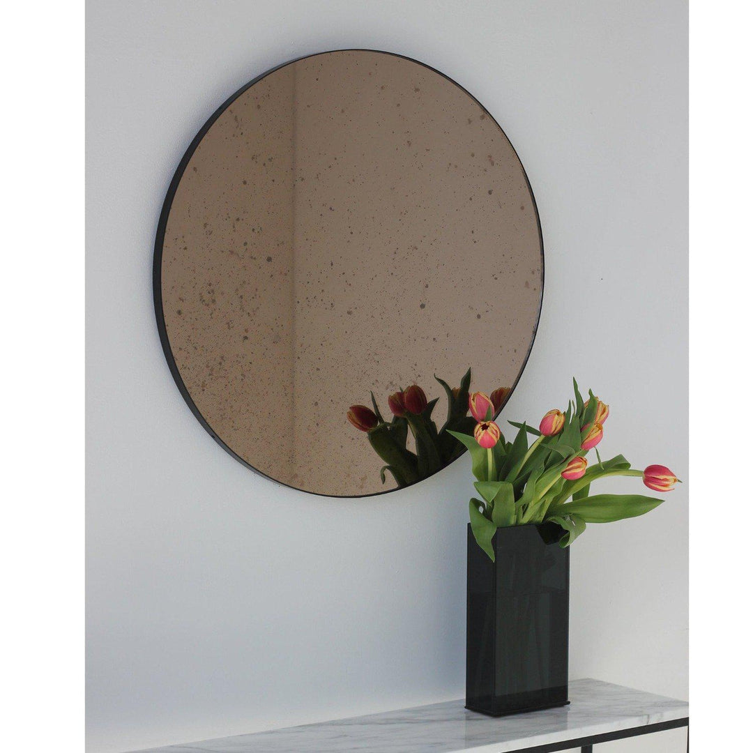 Antiqued Bronze Tinted Orbis Round Mirror - Black Frame