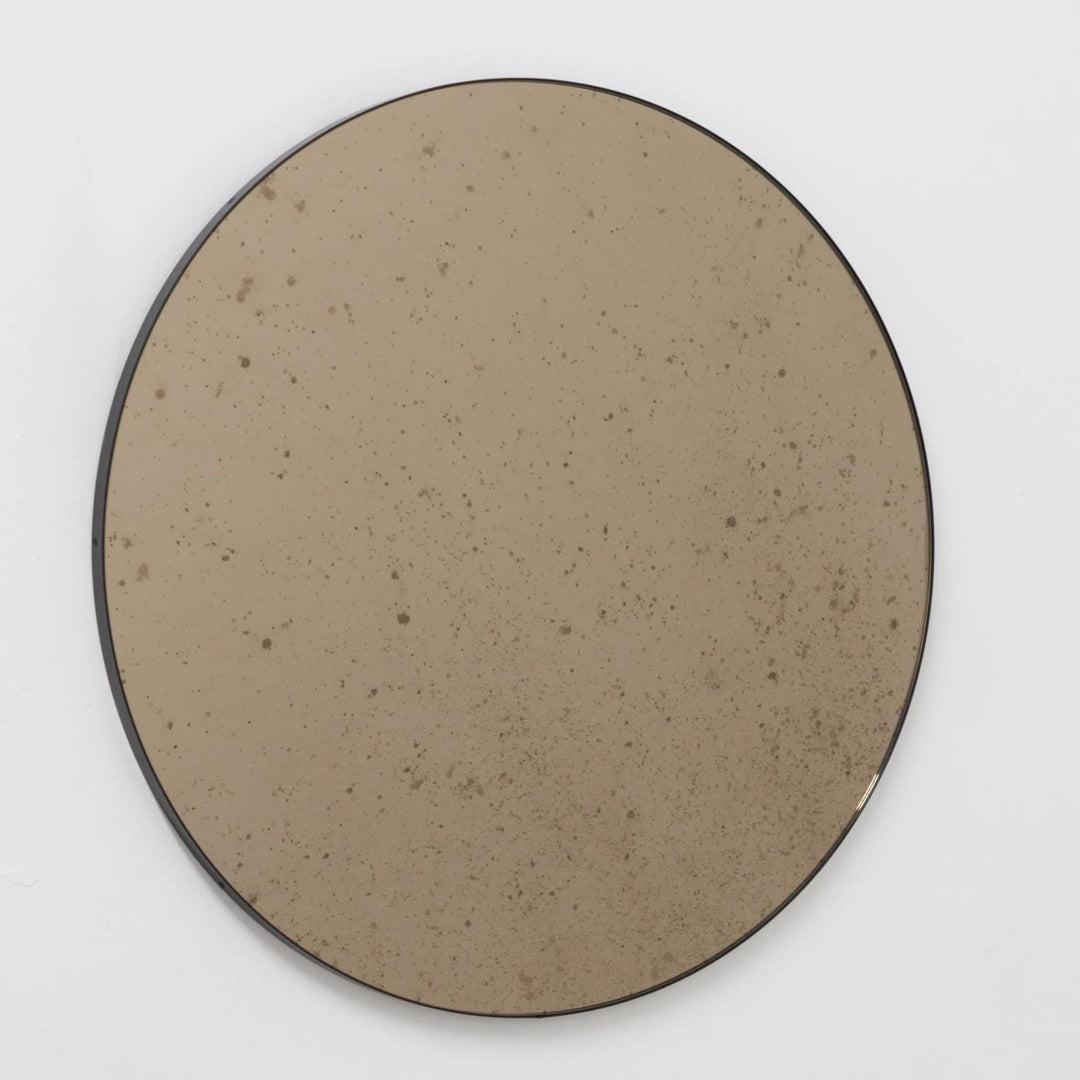 Antiqued Bronze Tinted Orbis Round Mirror - Black Frame